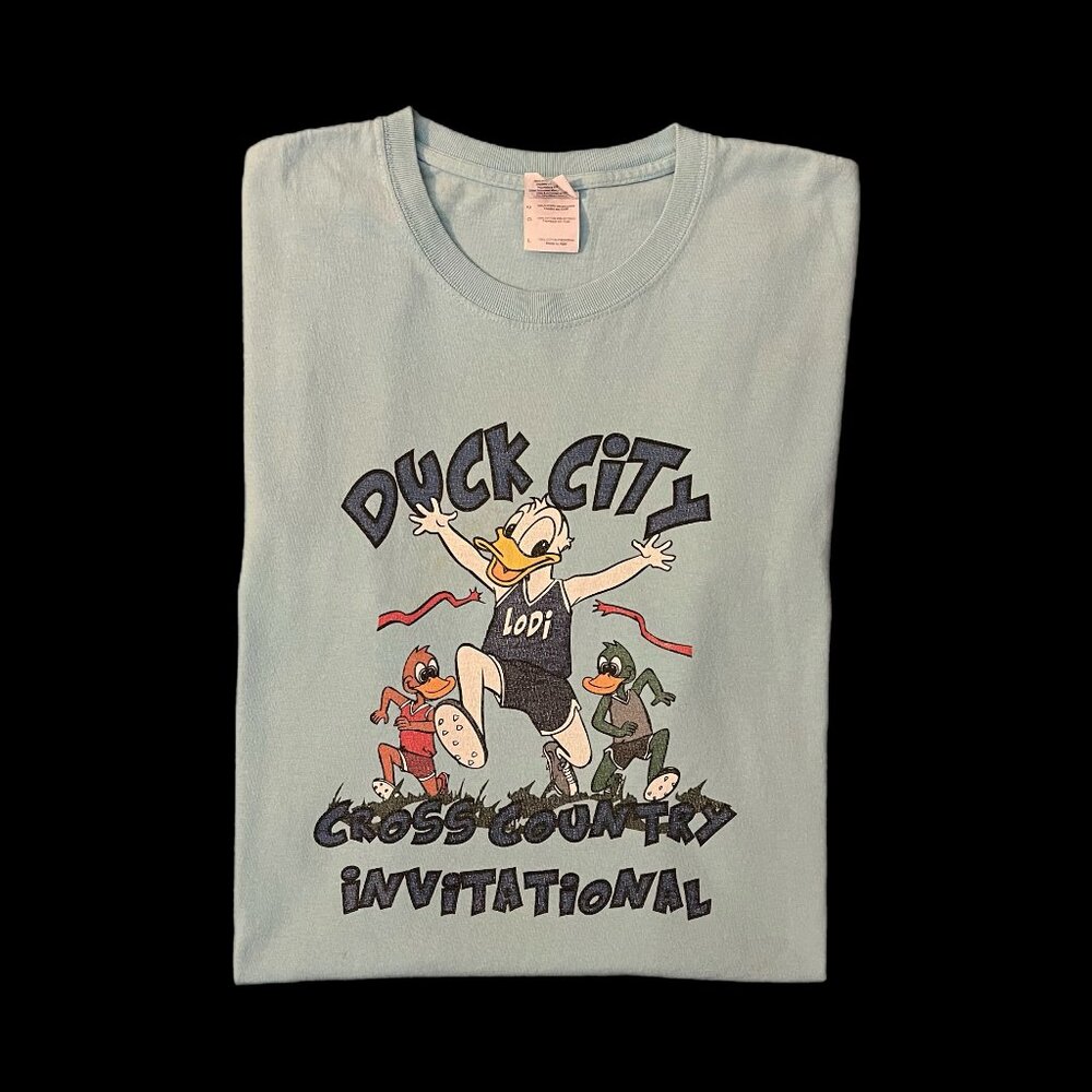 Year 2000s 00s Duck City Cross Country Invitational Sky Blue Graphic T-shirt Lrg